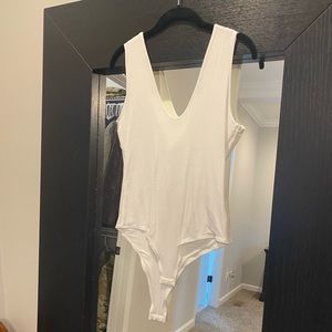 NWOT white bodysuit. Medium